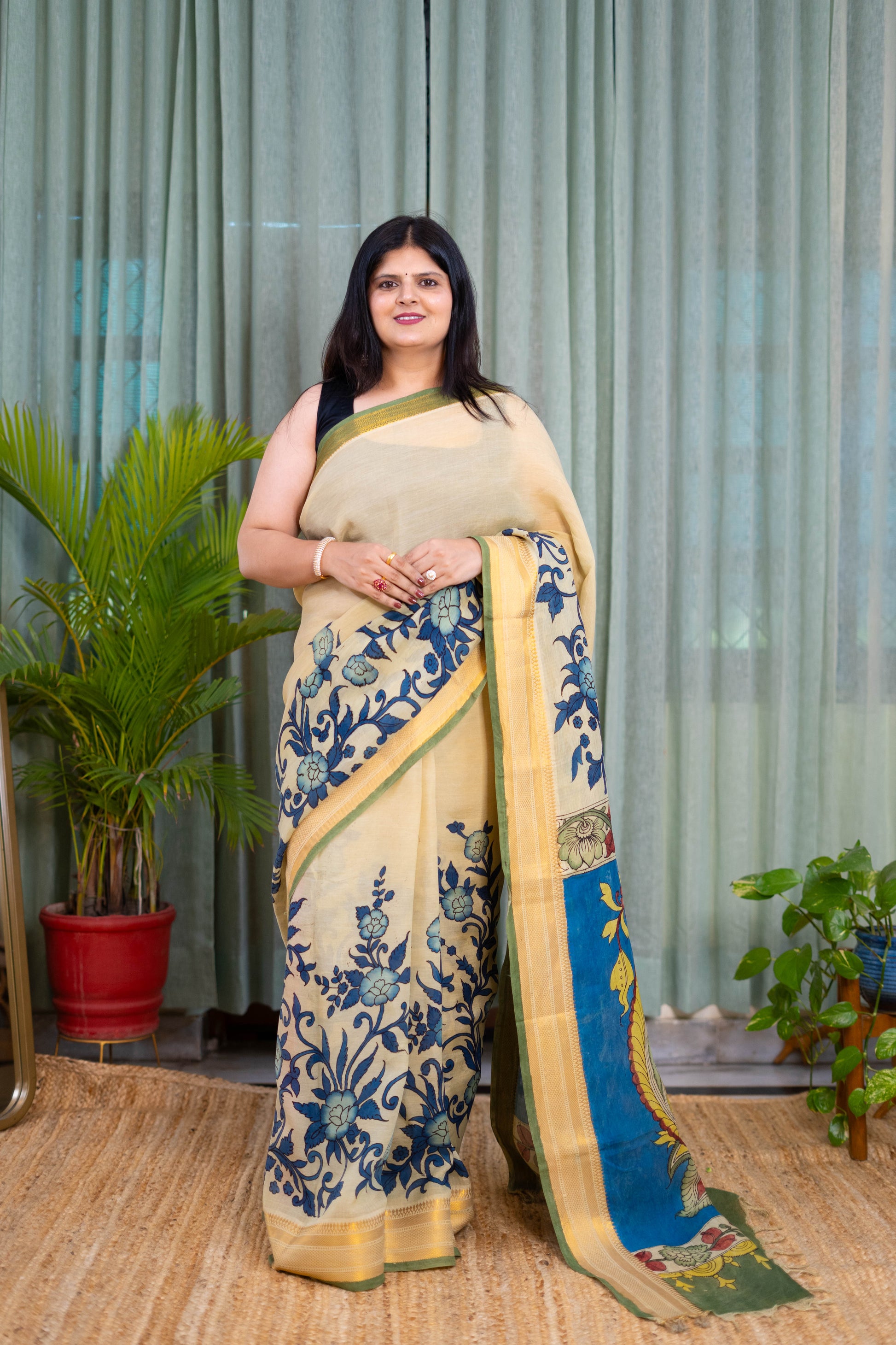Elegant Beige Kalamkari Saree with Blue Floral Detailing