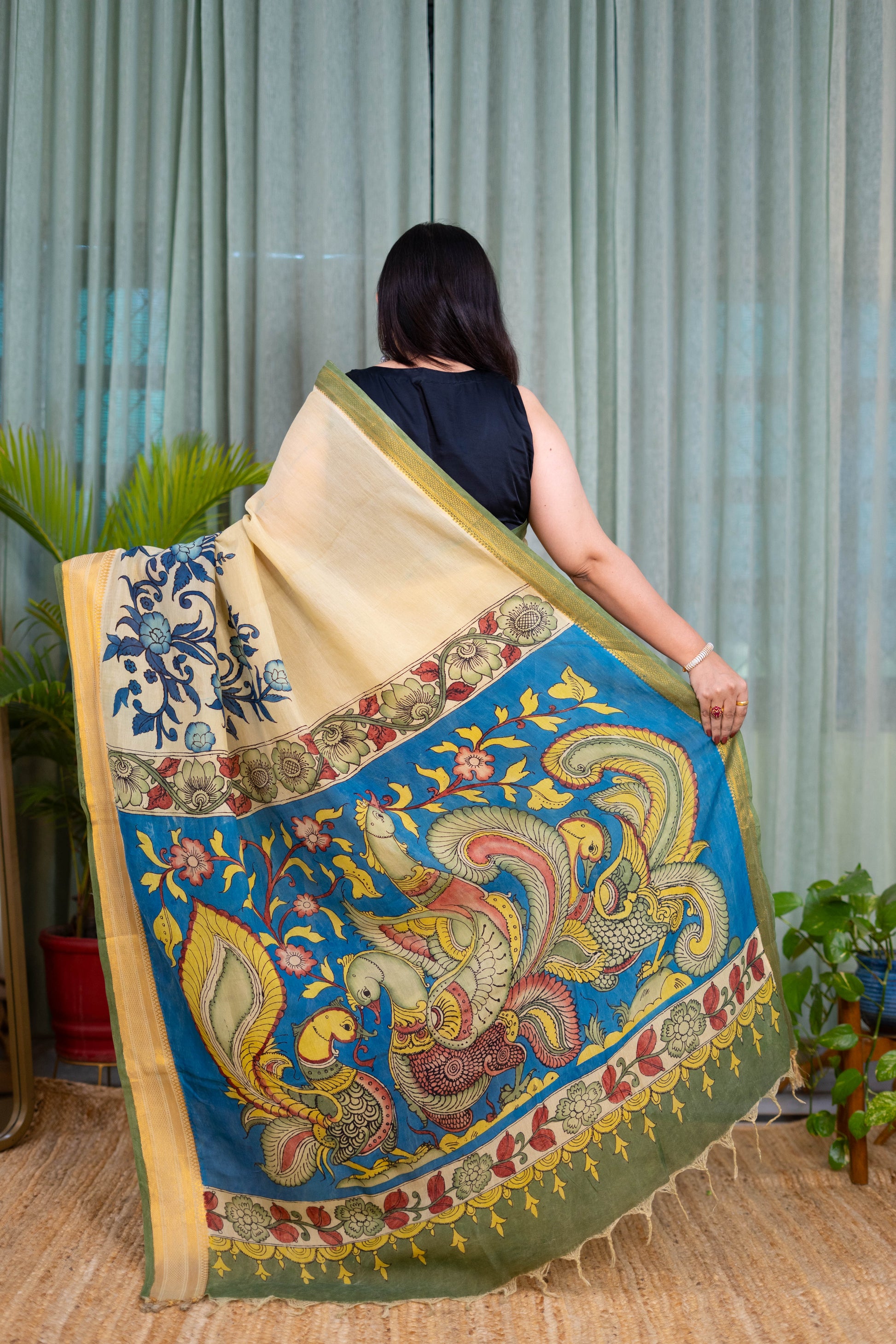 Elegant Beige Kalamkari Saree with Blue Floral Detailing