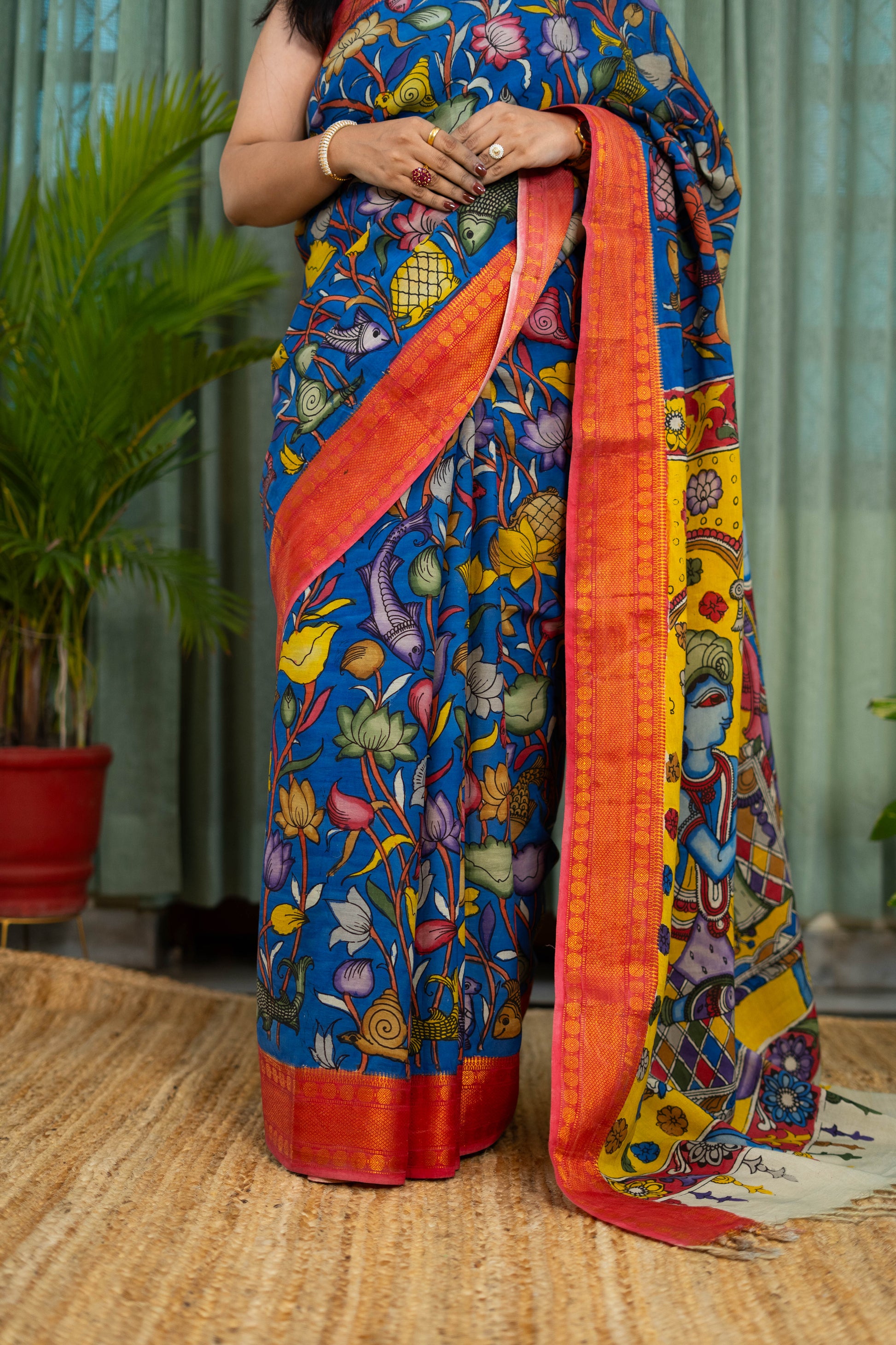 Royal Blue Kalamkari Saree with Vibrant Red Border