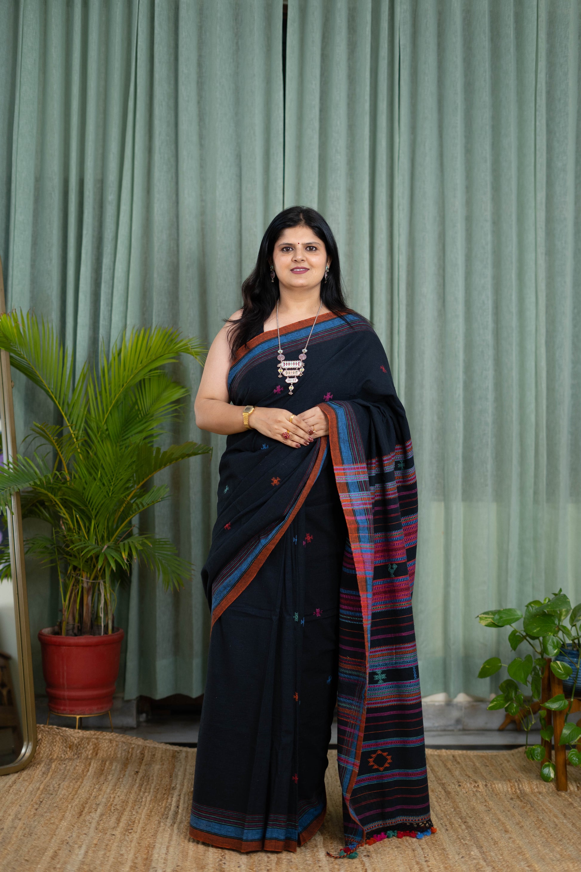 Handwoven Black Kala Cotton Saree with Multicolor Accents