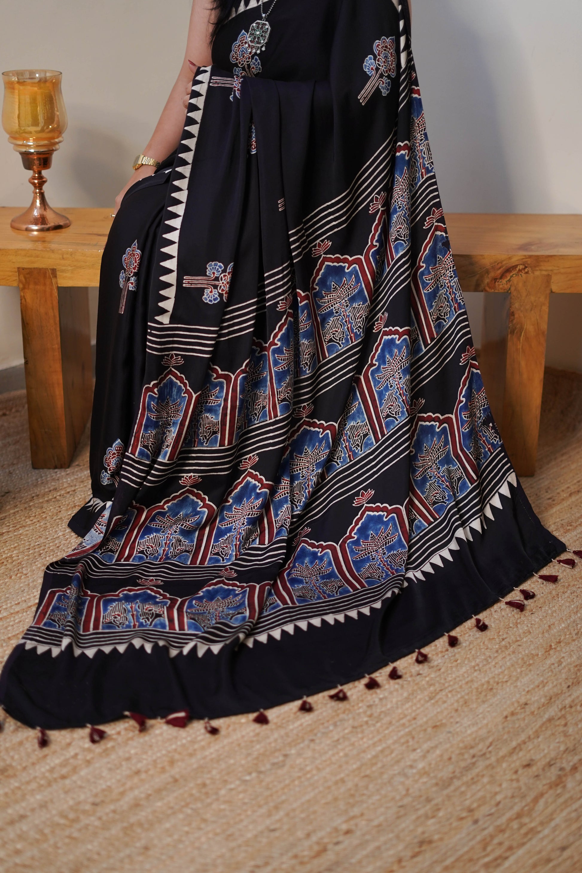 Black Printed Modal Silk Saree with Blue & Maroon Motifs and Tassel Pallu