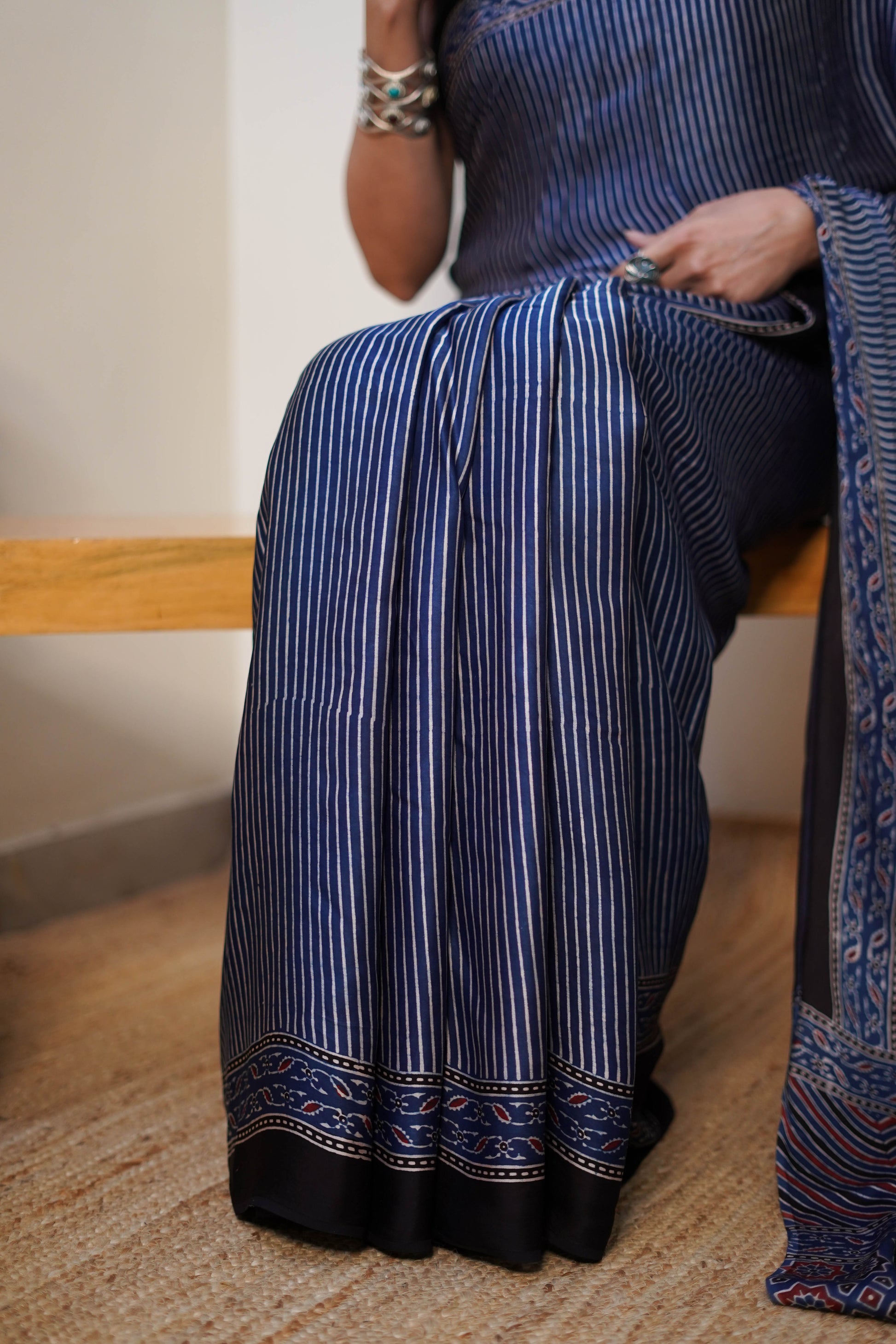 Navy Blue Striped Modal Silk Saree with Printed Border and Tassel Pallu