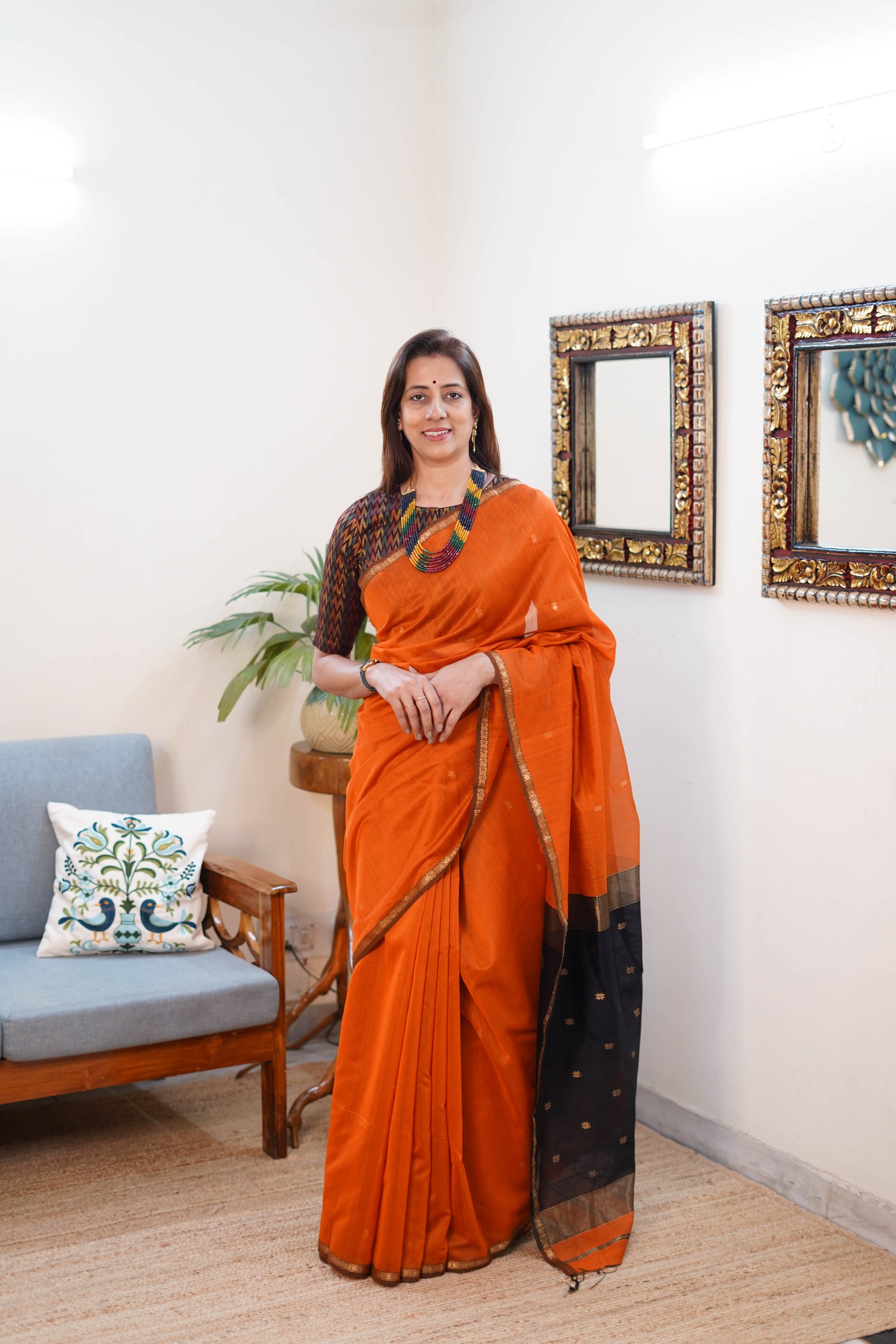 Maheshwari Silk Saree in Orange with Black and Gold Border