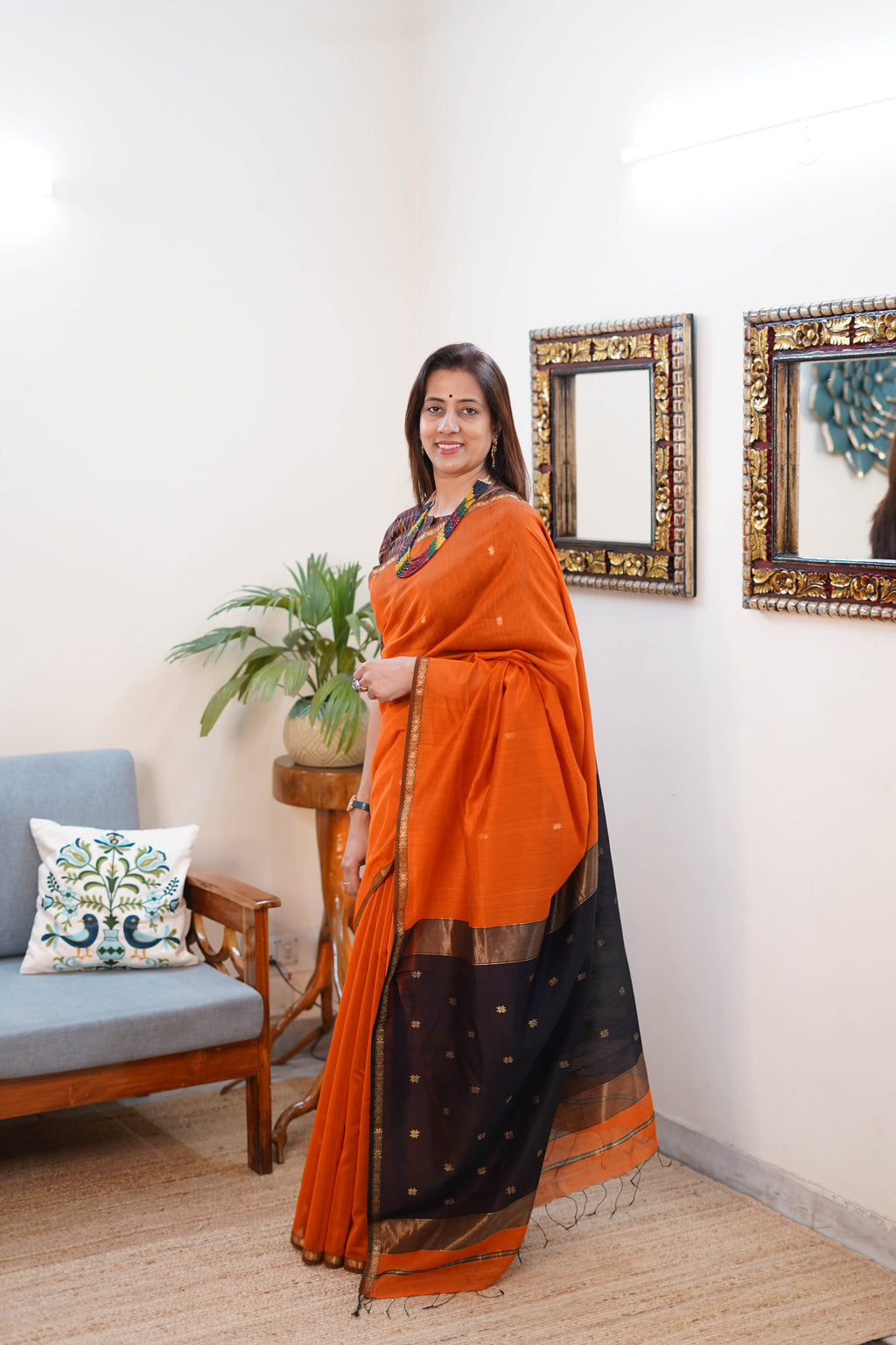 Maheshwari Silk Saree in Orange with Black and Gold Border