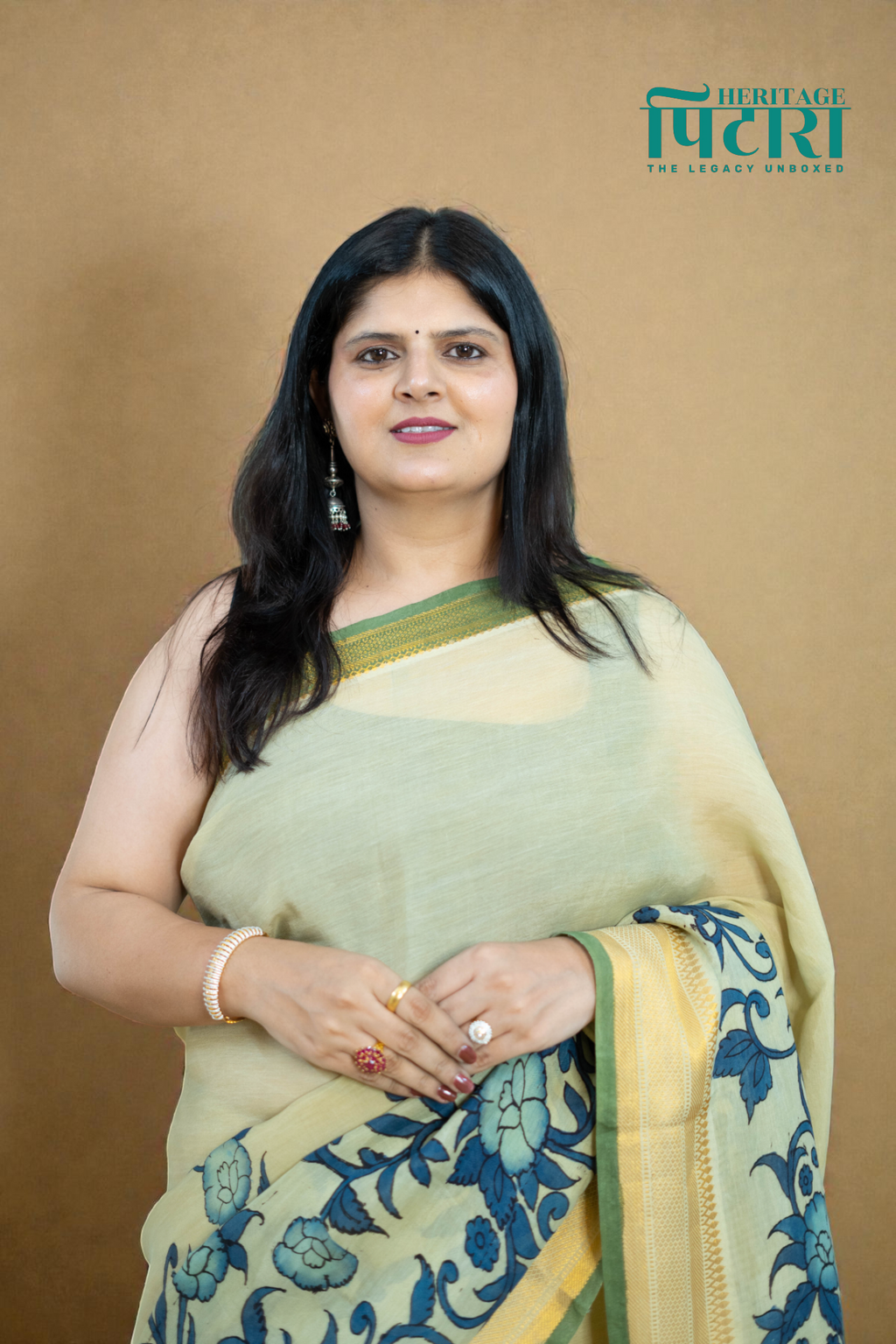 Elegant Beige Kalamkari Saree with Blue Floral Detailing