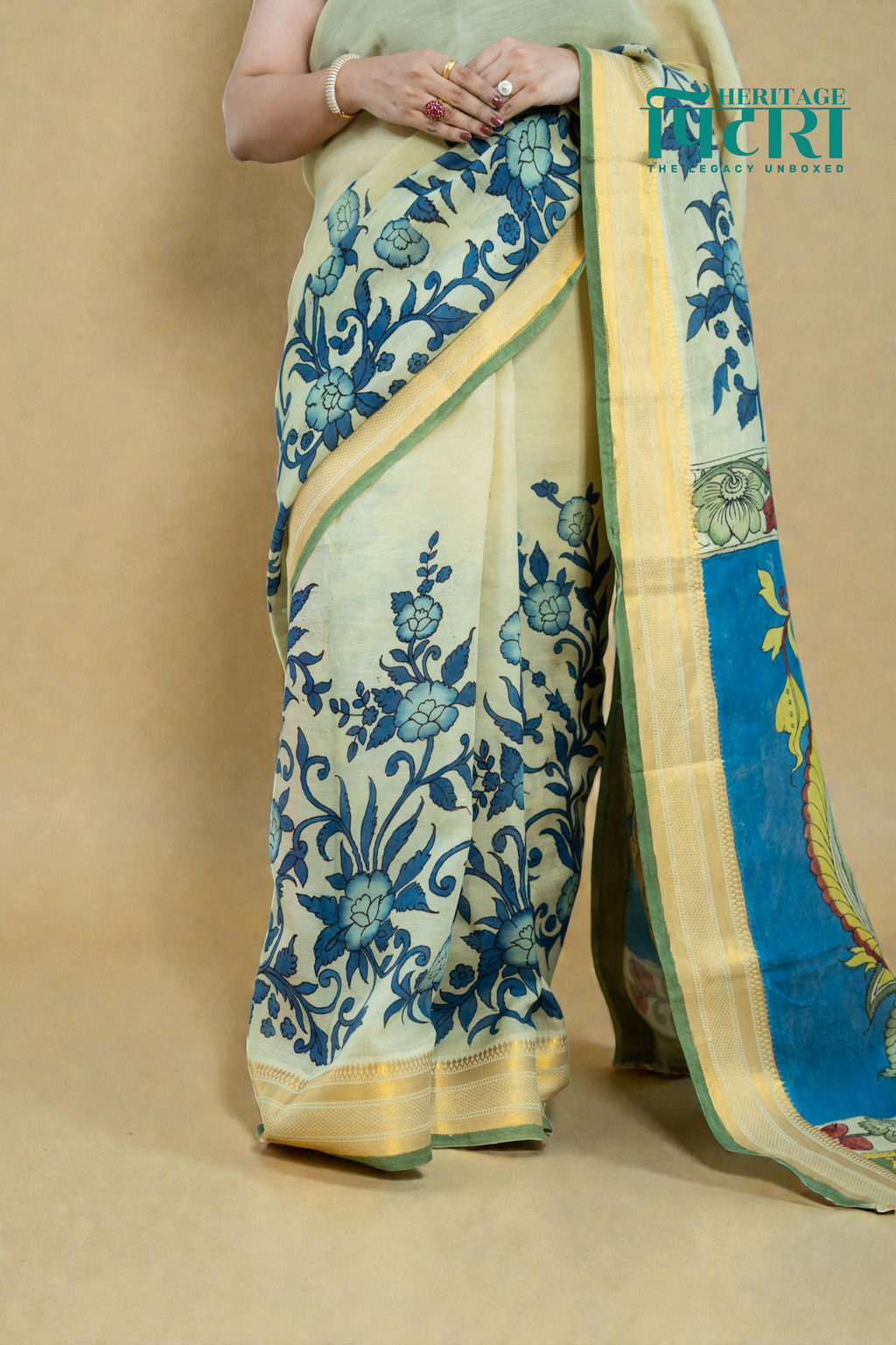 Elegant Beige Kalamkari Saree with Blue Floral Detailing