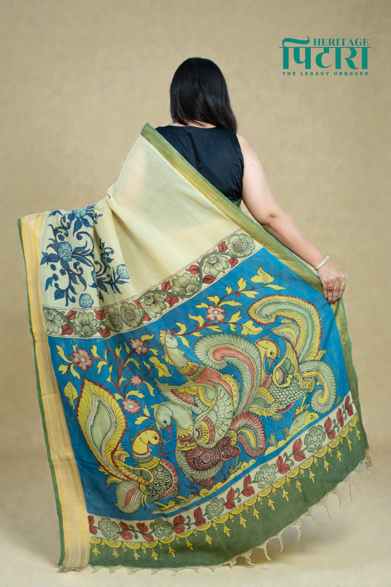 Elegant Beige Kalamkari Saree with Blue Floral Detailing