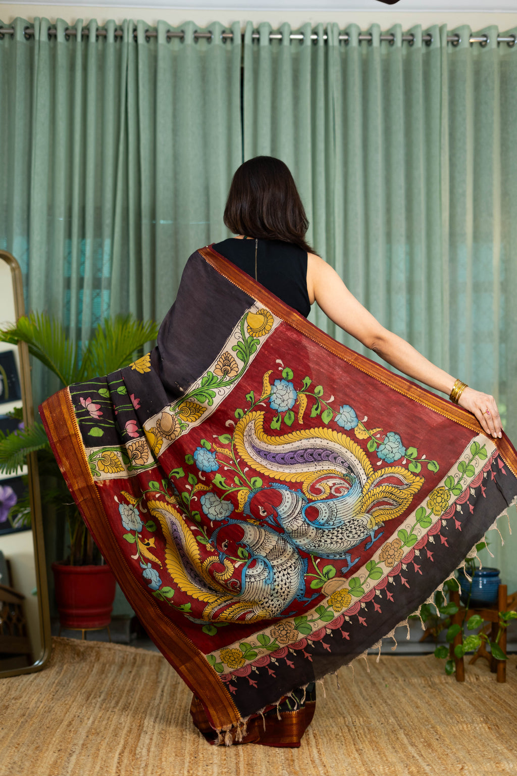 Elegant Black Kalamkari Silk Saree – Floral Hand-Painted Design