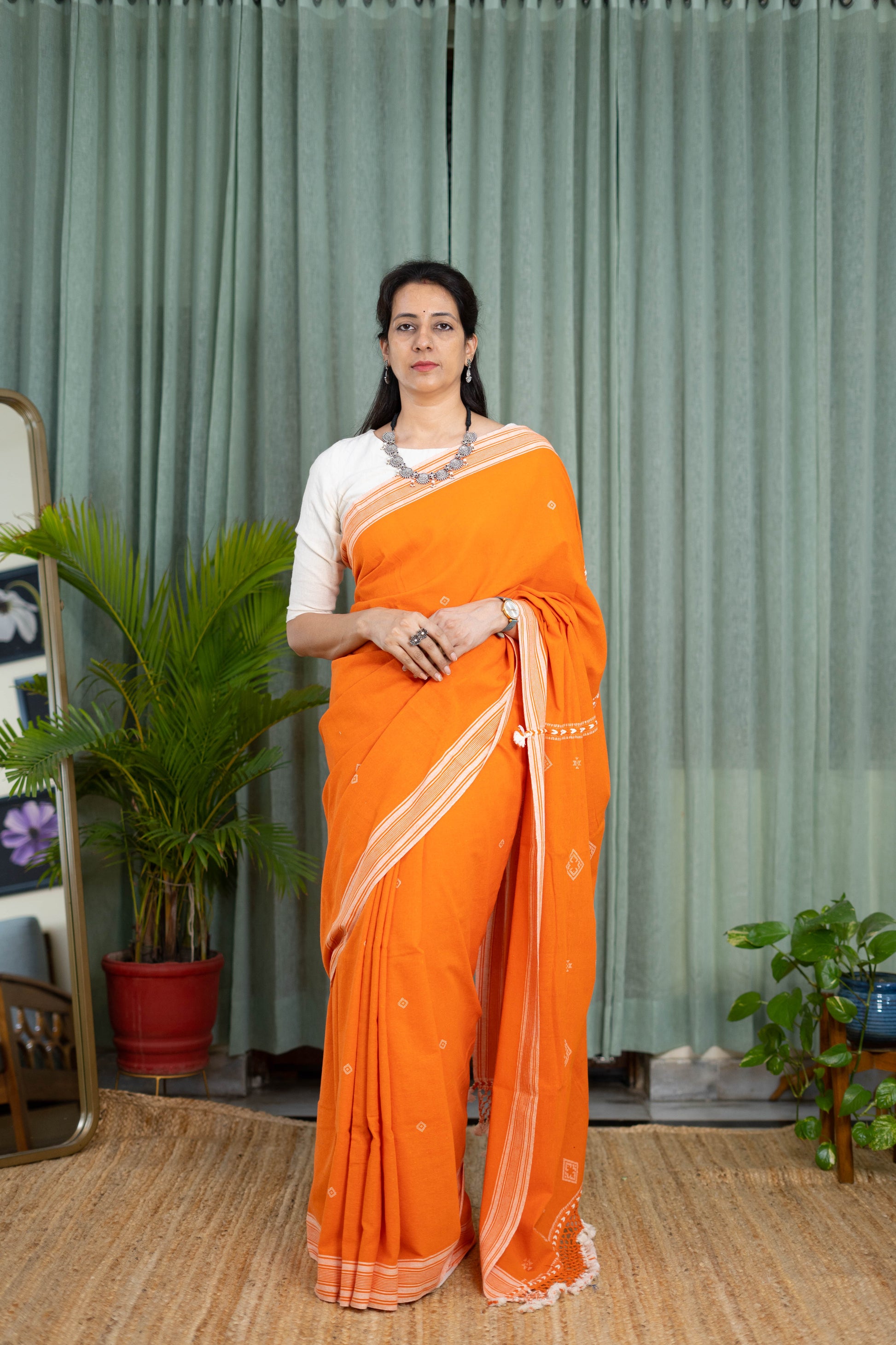 Handwoven Orange Kala Cotton Saree with White Borders